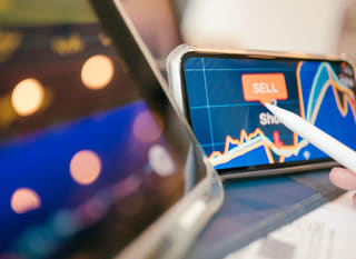Trader analyzing Bitcoin Ethereum and forex options across multiple markets